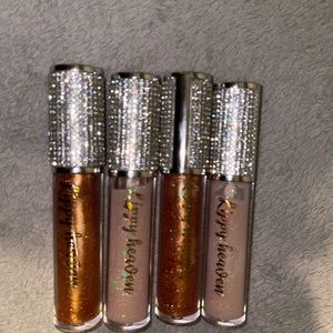 Rum and birthday cake scented lip glosses